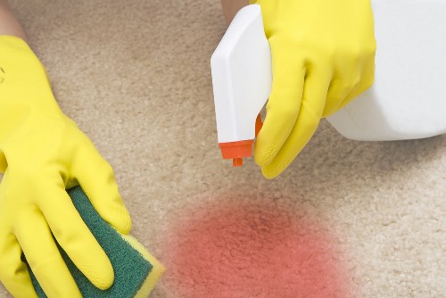 Professional upholstery cleaning for a sofa in a Harrow living room