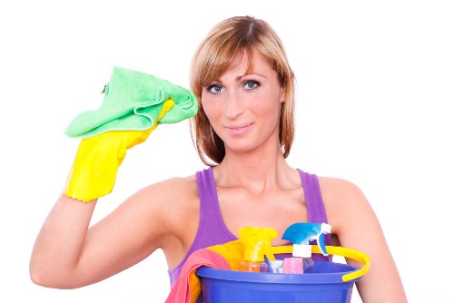 Upholstery cleaner treating stains on a sofa in Harrow