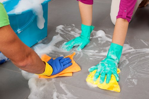 Office cleaner working in a Harrow workplace reception area